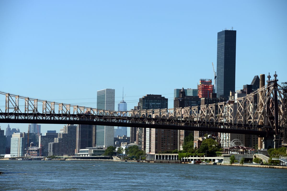 54 New York City Roosevelt Island Looking Dow The East River To The Ed Koch Queensboro Bridge, United Nations Building, One World Trade Center, Trump World Tower